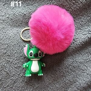 Pink Fluffy Keychain with Green Character